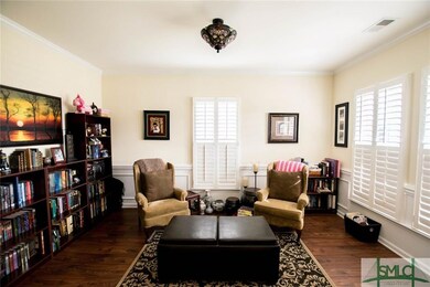 Study/Library/Formal Dining Room with Crowm Moldin