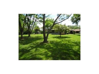 DOUBLE LOT CREATES A PARK LOT SETTING.