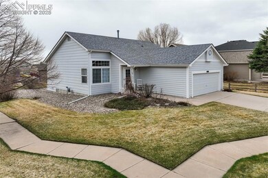 Single story home with a front yard, concrete driv