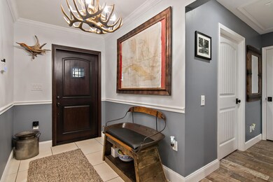 Front door and entry to master