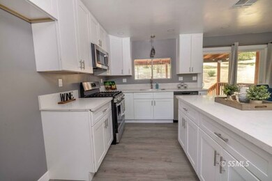 Kitchen with shaker cabinets & Quartz