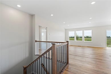 Photo is of a previously built home, this home will include a fireplace in living room. 