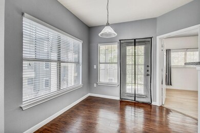 Unfurnished dining area with wood finished floors