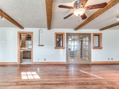 Walking into the home, you can see the large living room. This opens it to the study and kitchen,