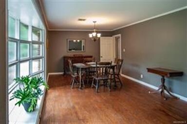 The Dining Room is open to the Living Room and has