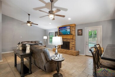 Living room featuring plenty of natural light, bas