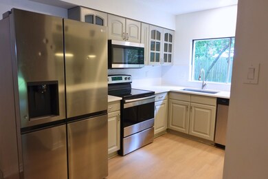 Modern kitchen with big sink and lots of counter s