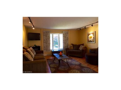 LIVING ROOM. NEW LAMINATE FLOORING. TRACK LIGHTING