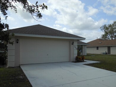 330 SW Inwood Ave, Port St. Lucie, FL 34984 - photo 3