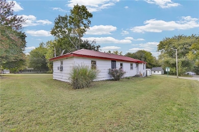 302 S Truman Rd, Archie, MO 64725 - photo 5