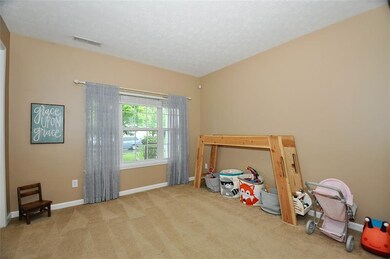 Formal living room currently being used as a kids playroom.