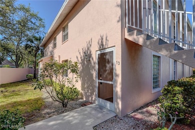View of property exterior with stucco siding and f