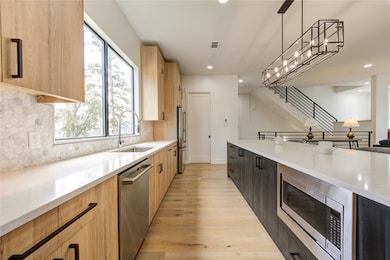 The walk-in pantry is the door straight ahead on t