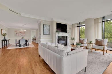 Living room featuring a chandelier, floor to ceili