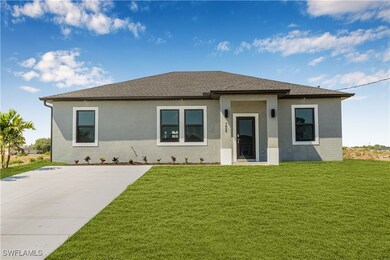 View of front of house with a front yard, a shingl