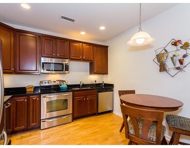 Wellington Crossing unit 401, Waltham, MA 02452 - photo 3