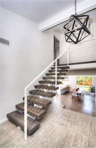 Great floor plan with the modern staircase leading