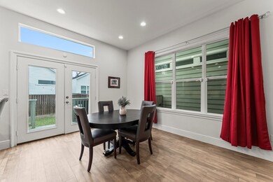 Lots of natural light from the wall of windows.  D