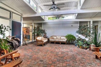 This beautiful Eichler atrium allows one to enter 