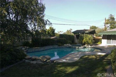 Pool, BBQ, and garden just off of the family room