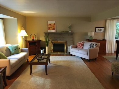 Beautiful living room featuring hardwood floors an