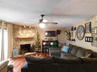 LIVING ROOM W/CORNER ELECTRIC FIREPLACE