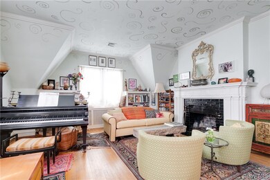 Living Room has beautiful architectural features. Wood-burning fireplace.