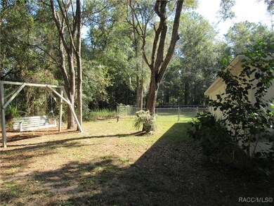 8929 N Elkcam Blvd, Citrus Springs, FL 34433 - photo 7
