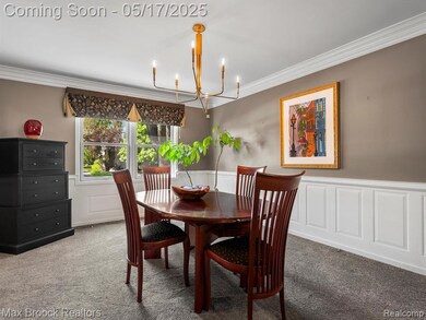 Dining room with large window.