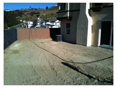 backyard is spacious and open