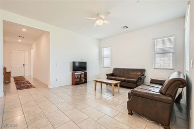 Living room featuring light tile patterned floors