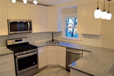 The kitchen has been completely remodeled w/ new m