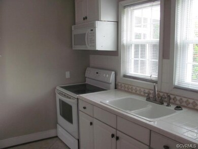 2nd view of kitchen - Stove, Built-in Microwave