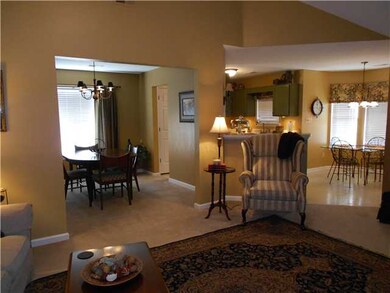 Looking from the middle of the den into the dining