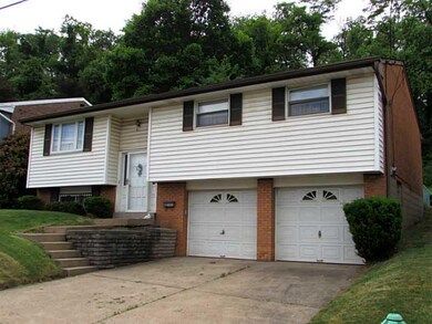 Exterior Front. The Double Wide Driveway provides 