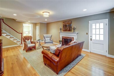 Fireplace with mantle and screened in side porch t