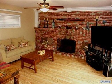 The family room with fireplace has a large closet 