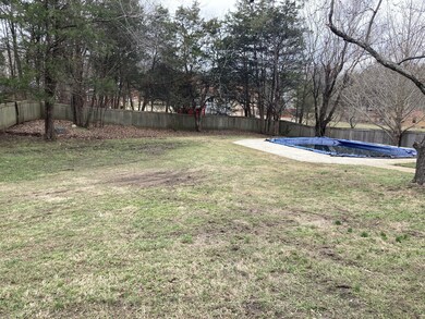Inground pool with new liner and pump. Privacy fence all around back yard.