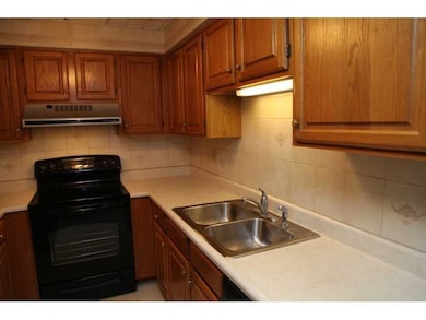 Kitchen. Updated Electric Stove & Disposal