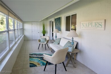 Enclosed lanai overlooking the water