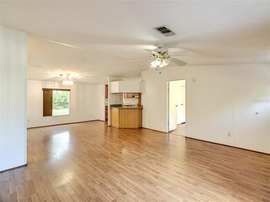 Overview of the family room, formal dining area an