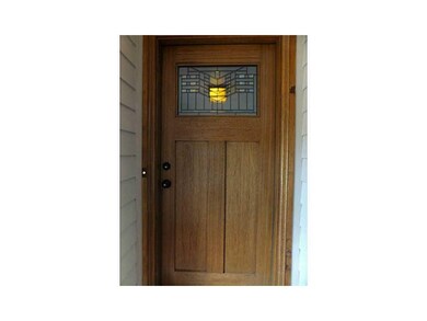 Foyer. Beautiful mission-style door will welcome f