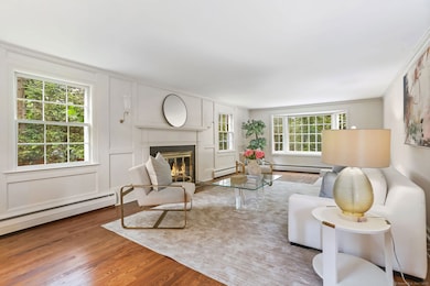 Beautiful panelling and wainscoting are found throughout the home, complimented by lots of light.