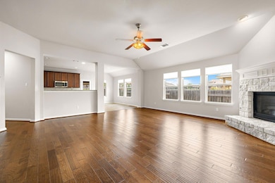 Unfurnished living room with lofted ceiling, visi