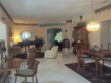 Great room has ceramic tile flooring that goes int