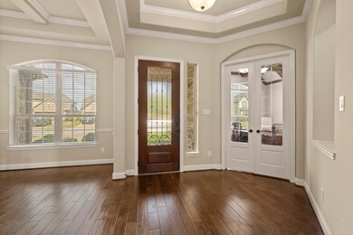 Crown molding through out the home.  Enjoy privacy in the office/study with large French doors.