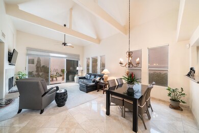 LOOKS OUT TO PATIO/YARD