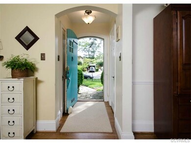 The foyer is welcoming with two coat closets, one 