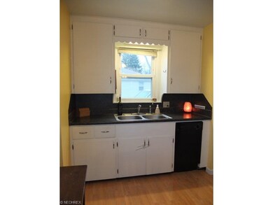 Kitchen has a dishwasher and pantry.