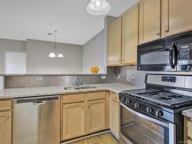 Another view of kitchen looking into dining area